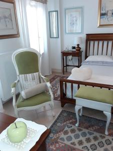A bed or beds in a room at Locanda Bellavista