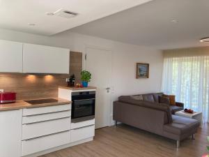 Küche/Küchenzeile in der Unterkunft Dünenwelle - 3 Zi, Kü, 2 Bäder, Balkon