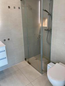 Ein Badezimmer in der Unterkunft Dünenwelle - 3 Zi, Kü, 2 Bäder, Balkon