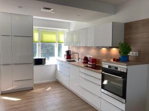Küche/Küchenzeile in der Unterkunft Dünenwelle - 3 Zi, Kü, 2 Bäder, Balkon
