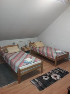 Postel nebo postele na pokoji v ubytování VILA NATALIJA APARTMANI + 23 fotografií