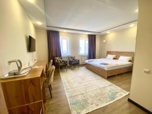 Postel nebo postele na pokoji v ubytování Arnau