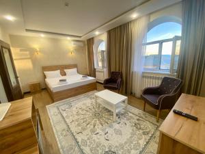 Postel nebo postele na pokoji v ubytování Arnau