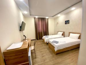 Postel nebo postele na pokoji v ubytování Arnau