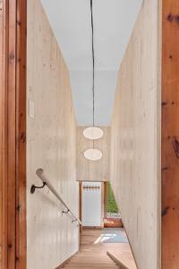 a large concrete wall in a hallway with a staircase at Chambers Hollow in Walton