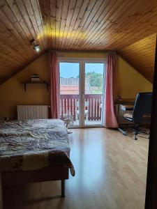 Postel nebo postele na pokoji v ubytování Apartment Katja