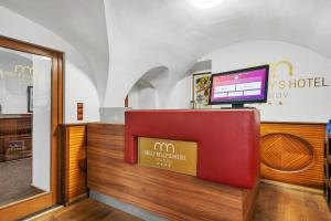 TV a/nebo společenská místnost v ubytování Hotel Nelly Kellys