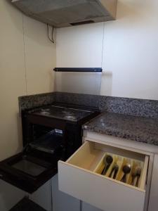 A cozinha ou cozinha compacta de Cheverny Apart Hotel