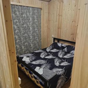 Postel nebo postele na pokoji v ubytování Sevan Barca Beach
