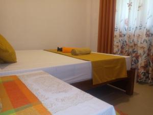 Letto o letti in una camera di ALEXANDRA HOME for foreign tourists only