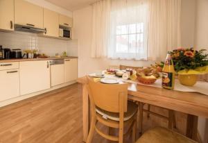 Kuchyň nebo kuchyňský kout v ubytování Ferienwohnung Pilsensee