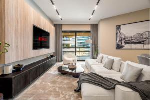 TV a/nebo společenská místnost v ubytování Luxury Saadiyat Soul Beach Residence