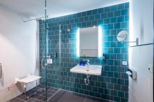 Koupelna v ubytování Holiday Inn - the niu, Fender Amsterdam + 63 fotografií