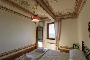 Кровать или кровати в номере Casa Politi Boutique Villa in the heart of Tuscany