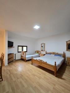 Postel nebo postele na pokoji v ubytování STD "Vila Bor" Stara planina