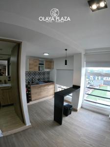 Kuchyň nebo kuchyňský kout v ubytování Hotel Olaya Plaza