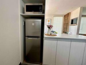 Kuchyň nebo kuchyňský kout v ubytování Moderno departamento en Calacoto
