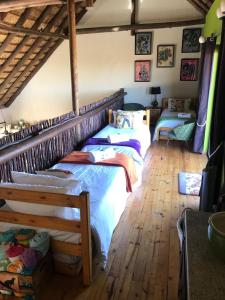Ένα ή περισσότερα κρεβάτια σε δωμάτιο στο Lodge Twentyfour Mabalingwe Nature Reserve