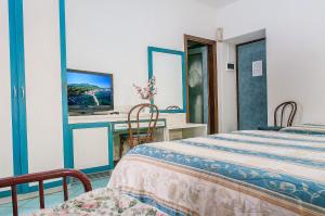 Postel nebo postele na pokoji v ubytování Hotel Annabelle