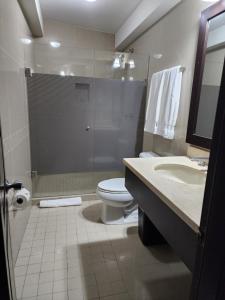 Koupelna v ubytování Hotel Maria Elena