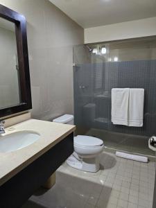 Koupelna v ubytování Hotel Maria Elena