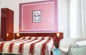 Postel nebo postele na pokoji v ubytování Hotel Annabelle