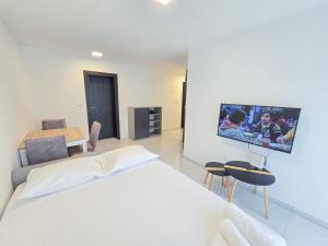TV a/nebo společenská místnost v ubytování Green Diamond