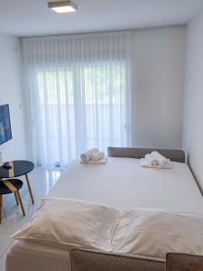 Postel nebo postele na pokoji v ubytování Green Diamond