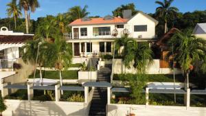Zahrada ubytování Casa Sirena - Habitaciones a orilla de la Laguna y Cenote Esmeralda