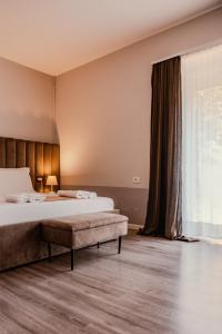 Postel nebo postele na pokoji v ubytování Bejart Apartment 1