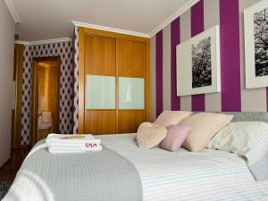 Postel nebo postele na pokoji v ubytování Piso Millenium