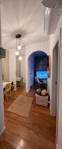 TV a/nebo společenská místnost v ubytování Giuggiola Apartment