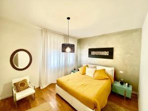 Postel nebo postele na pokoji v ubytování Giuggiola Apartment