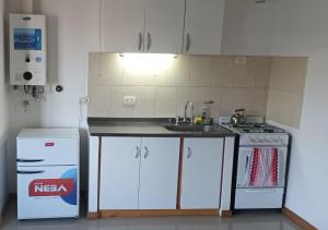 Kuchyň nebo kuchyňský kout v ubytování Mi Espacio en Gualeguaychú