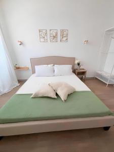 Ένα ή περισσότερα κρεβάτια σε δωμάτιο στο Essence Apartment