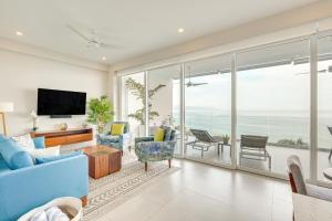 a living room with a view of the ocean at Puerto Vallarta Resort Condo, On-Site Beach Access in Puerto Vallarta