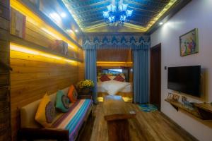 Sjónvarps- og/eða afþreyingartæki á Floral Hotel · Baihui Living Zhangjiajie