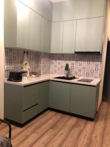 Kuchyň nebo kuchyňský kout v ubytování Bamboo beach tsikhisdziri