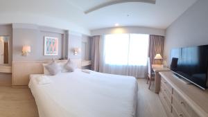 Μια τηλεόραση ή/και κέντρο ψυχαγωγίας στο 琉球オリオンホテル 那覇国際通り +25 φωτογραφίες