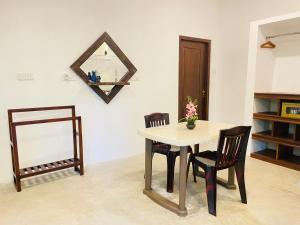 Fotografie z fotogalerie ubytování Lawrence Villa v destinaci Weligama