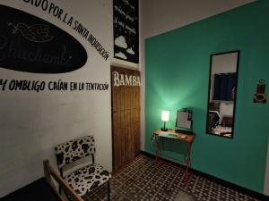 TV a/nebo společenská místnost v ubytování Chuchumbé Hotel & Hostal