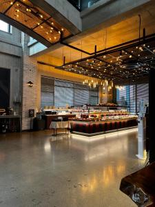 a large room with aasteryasteryasteryasteryasteryasteryasteryasteryasteryasteryastery at The Urban Sanctuary Paju in Paju