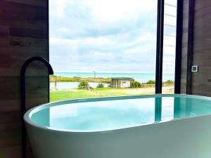 Bazén v ubytování Luxury Absolute Ocean View Lodge nebo v jeho okolí