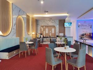 Posezení v ubytování UNHAS HOTEL & CONVENTION