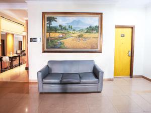 Istumisnurk majutusasutuses Grande Hotel Lampung Powered by Archipelago