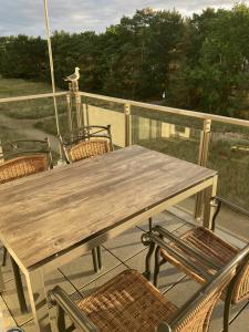Ein Balkon oder eine Terrasse in der Unterkunft Dünenwelle - 3 Zi, Kü, 2 Bäder, Balkon