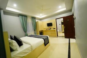 TV a/nebo společenská místnost v ubytování Hotel Ishta + 27 fotografií