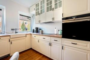 Kuchyň nebo kuchyňský kout v ubytování Ferienwohnung am Ostufer