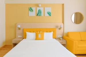 Bloom Hotel Katra客房内的一张或多张床位