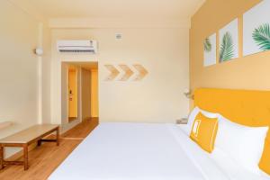 Bloom Hotel Katra客房内的一张或多张床位
